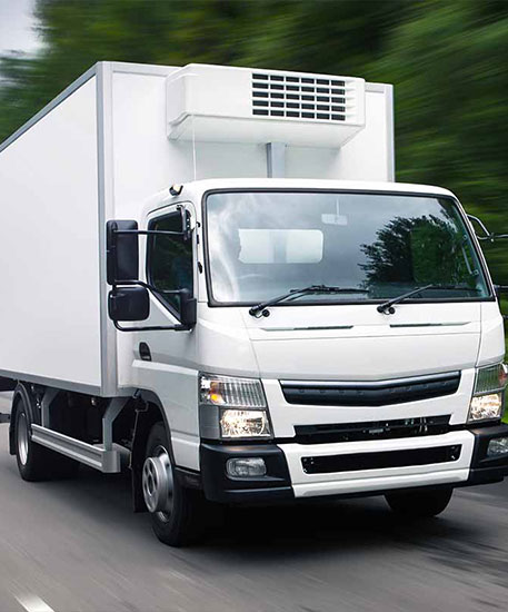 White refrigerated delivery truck